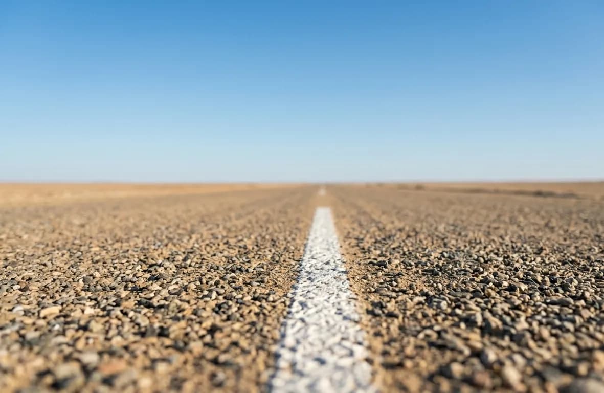 Desert road stretching into the horizon